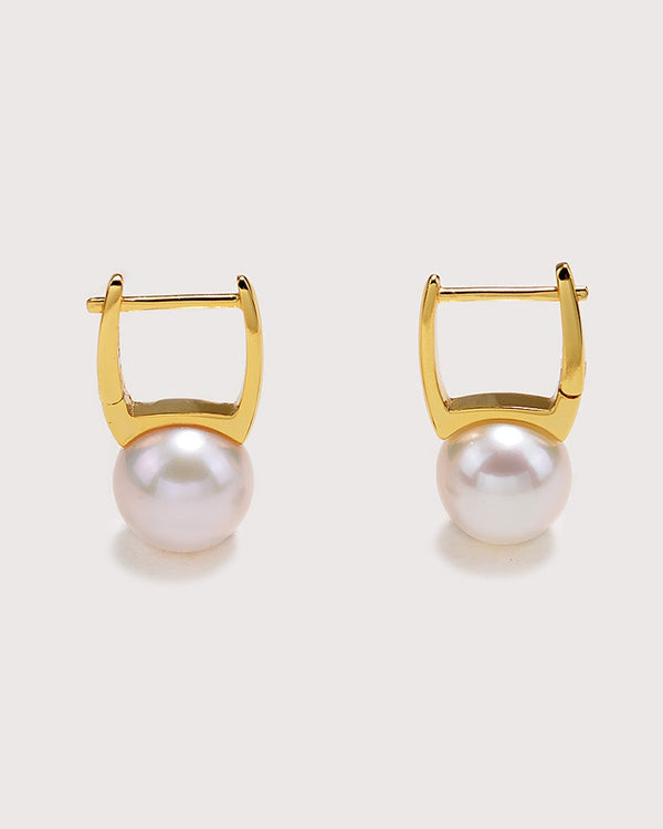 Gold hoop earrings with pearl centers on a white background, featuring the brand 'moonswish'.